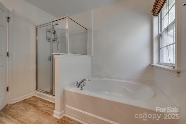 3040 Sunshower Hts, York, SC 29745 - bathroom featuring a bath, a wealth of natural light, and a shower stall