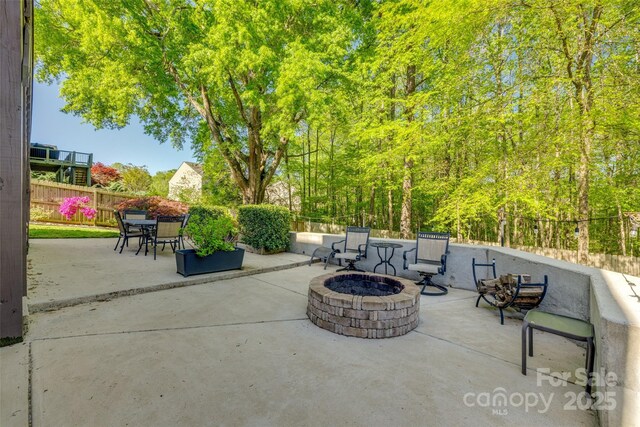 3040 Sunshower Hts, York, SC 29745 - view of patio with fence and a fire pit