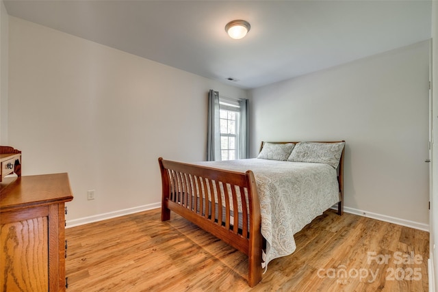 3040 Sunshower Hts, York, SC 29745 - bedroom with baseboards, light wood-style flooring, and visible vents