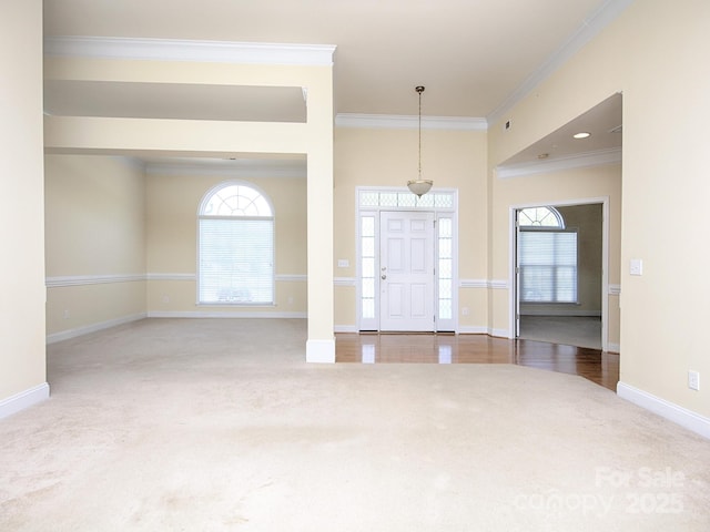 126 Dairy Farm Rd, Mooresville, NC 28115 - carpeted entrance foyer with ornamental molding and baseboards