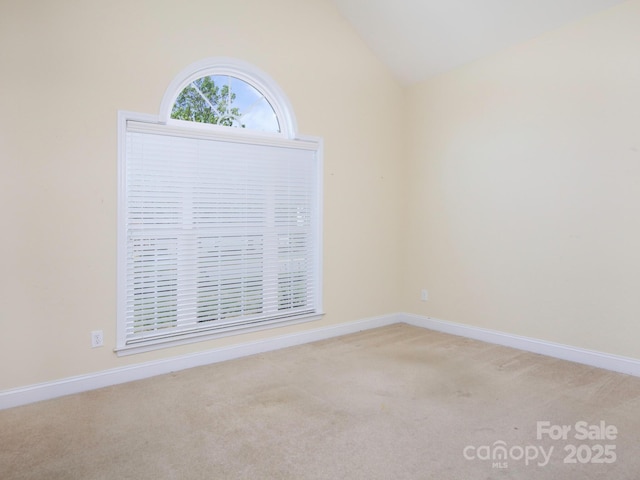 126 Dairy Farm Rd, Mooresville, NC 28115 - empty room with light carpet, baseboards, and lofted ceiling