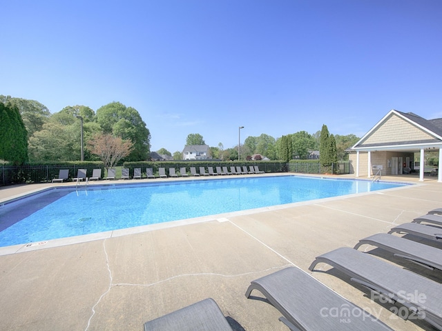 126 Dairy Farm Rd, Mooresville, NC 28115 - pool with a patio and fence