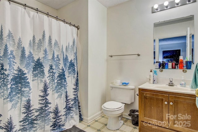 800 Meadowview Dr Unit # 2, Boone, NC 28607 - bathroom featuring toilet, vanity, baseboards, curtained shower, and a textured ceiling