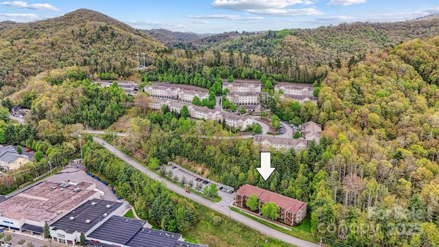 800 Meadowview Dr Unit # 2, Boone, NC 28607 - aerial overview of property's location featuring a heavily wooded area and a mountain backdrop