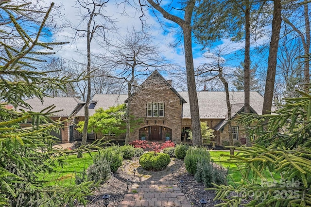 205 W Indrio Rd, Blowing Rock, NC 28605 - tudor home featuring stone siding and roof with shingles
