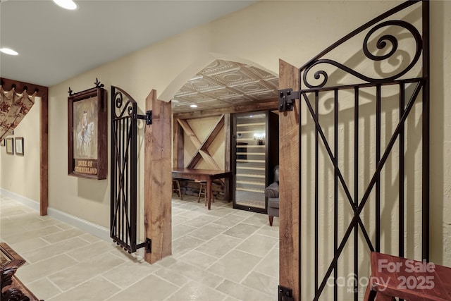 205 W Indrio Rd, Blowing Rock, NC 28605 - wine area featuring recessed lighting, baseboards, and arched walkways