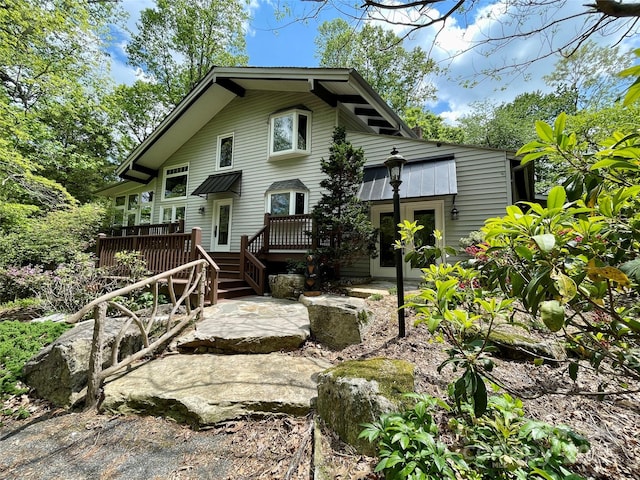 view of front of home with a wooden deck