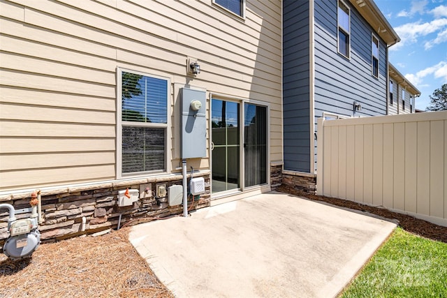 view of patio with fence