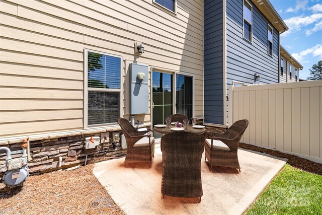 view of patio / terrace with fence