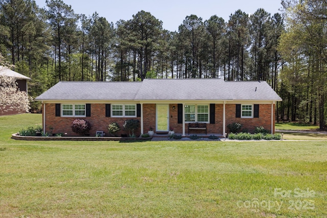 5381 Mount Carmel Rd, Heath Springs, SC 29058 - ranch-style house with brick siding and a front lawn