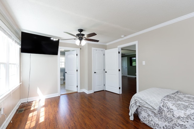 5381 Mount Carmel Rd, Heath Springs, SC 29058 - bedroom featuring baseboards, a textured ceiling, crown molding, and wood finished floors