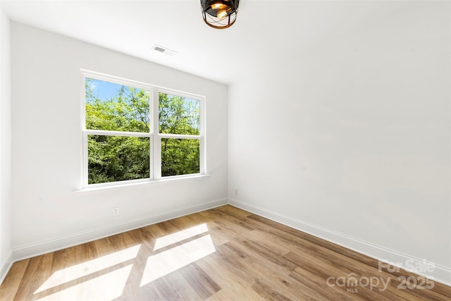 2043 Greenoak Dr, Shelby, NC 28152 - spare room with visible vents, baseboards, and light wood-style flooring
