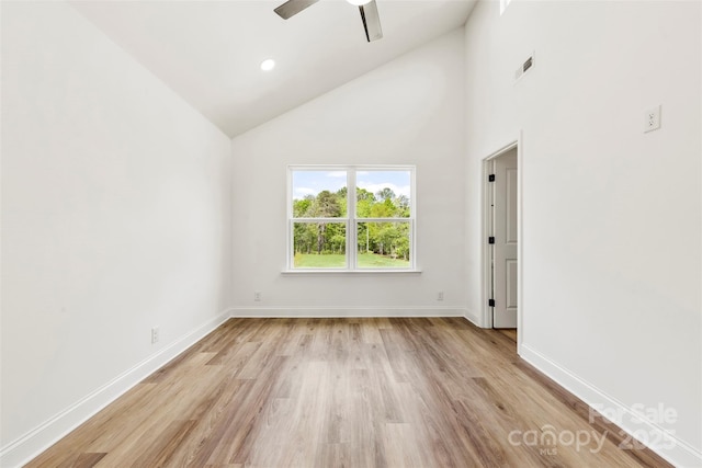 2043 Greenoak Dr, Shelby, NC 28152 - spare room featuring ceiling fan, high vaulted ceiling, light wood-style flooring, visible vents, and baseboards