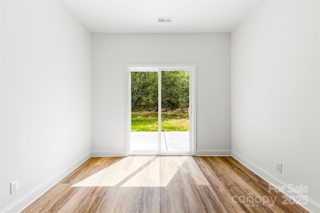 2043 Greenoak Dr, Shelby, NC 28152 - empty room with wood finished floors, baseboards, and visible vents