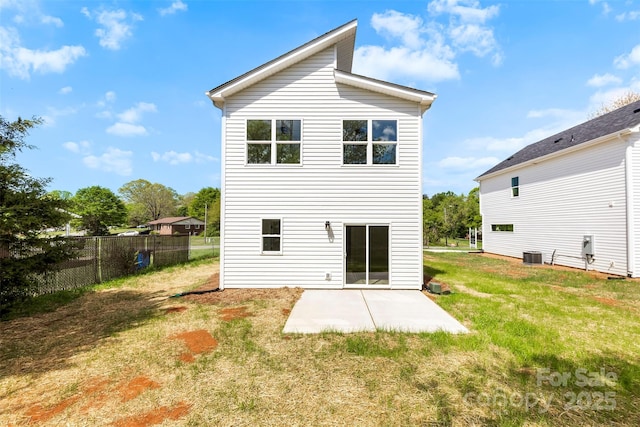 2043 Greenoak Dr, Shelby, NC 28152 - back of property featuring a patio area, central AC unit, fence, and a lawn