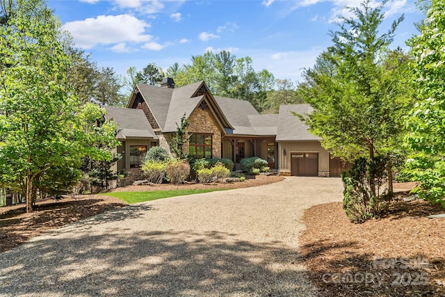 92 Gobblers Neck Dr, Nebo, NC 28761 - craftsman-style home with a chimney, stone siding, gravel driveway, a garage, and a shingled roof