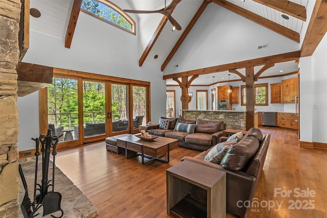 92 Gobblers Neck Dr, Nebo, NC 28761 - living area featuring high vaulted ceiling, light wood finished floors, beam ceiling, and ceiling fan