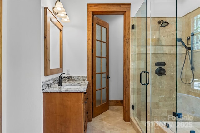 92 Gobblers Neck Dr, Nebo, NC 28761 - bathroom with french doors, a shower stall, and vanity