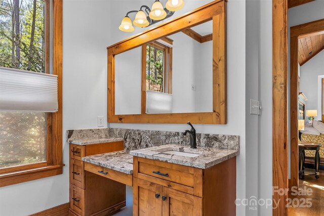 92 Gobblers Neck Dr, Nebo, NC 28761 - bathroom with vanity and an inviting chandelier