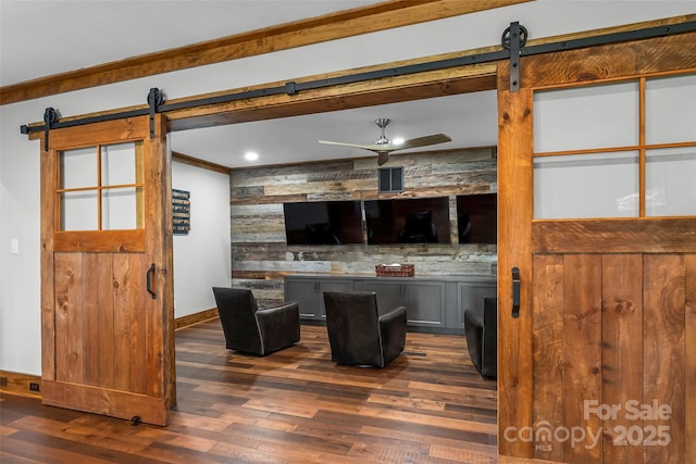 92 Gobblers Neck Dr, Nebo, NC 28761 - kitchen featuring dark wood-style flooring, baseboards, a ceiling fan, and a barn door