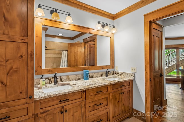 92 Gobblers Neck Dr, Nebo, NC 28761 - bathroom with double vanity, a sink, and ornamental molding