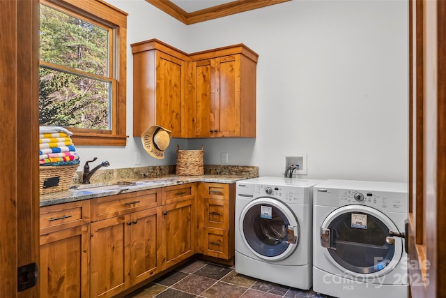 92 Gobblers Neck Dr, Nebo, NC 28761 - washroom with ornamental molding, washer and clothes dryer, cabinet space, stone finish flooring, and a sink