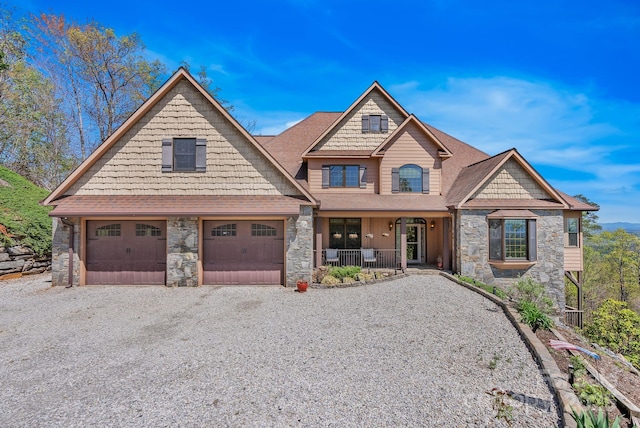 498 Pinnacle Pkwy, Union Mills, NC 28167 - craftsman house with gravel driveway, stone siding, a shingled roof, and covered porch