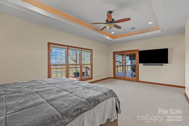 498 Pinnacle Pkwy, Union Mills, NC 28167 - carpeted bedroom featuring baseboards, a ceiling fan, a tray ceiling, recessed lighting, and access to exterior