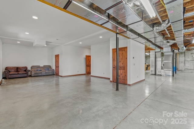 498 Pinnacle Pkwy, Union Mills, NC 28167 - unfinished basement featuring baseboards, recessed lighting, and heating unit