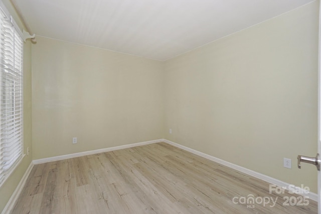 368 NW Dr, Davidson, NC 28036 - empty room with light wood-type flooring and baseboards