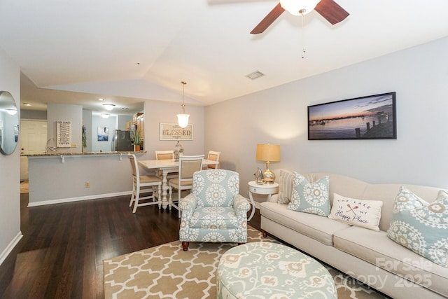 765 SW Dr, Davidson, NC 28036 - living room featuring a ceiling fan, visible vents, wood finished floors, lofted ceiling, and baseboards