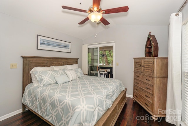 765 SW Dr, Davidson, NC 28036 - bedroom featuring dark wood-type flooring, access to exterior, baseboards, and vaulted ceiling