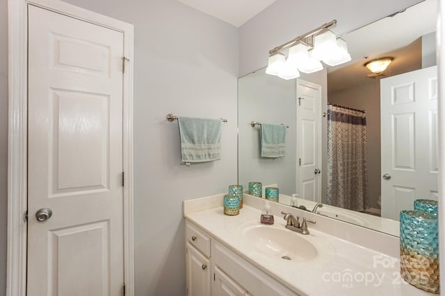 765 SW Dr, Davidson, NC 28036 - bathroom with vanity and toilet