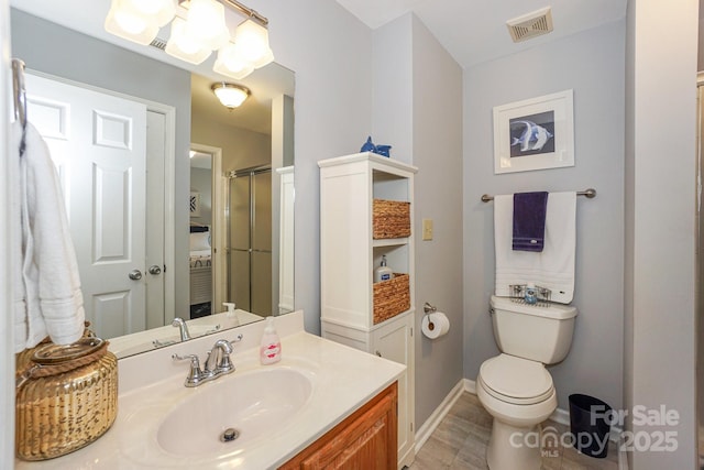 765 SW Dr, Davidson, NC 28036 - full bathroom with a shower with door, vanity, baseboards, toilet, and visible vents