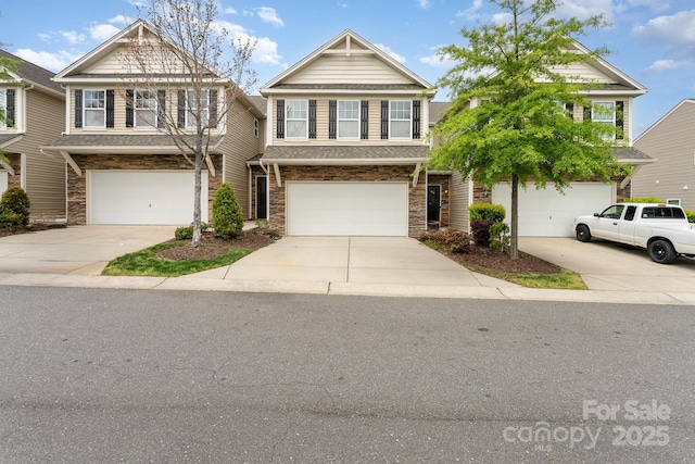 832 Summerlake Dr, Fort Mill, SC 29715 - view of property with an attached garage, driveway, and stone siding