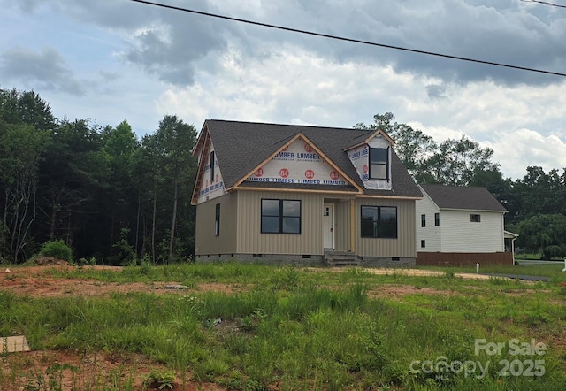 8940 Wilson Rd, Hildebran, NC 28637 - view of front facade with crawl space, entry steps, and a shingled roof