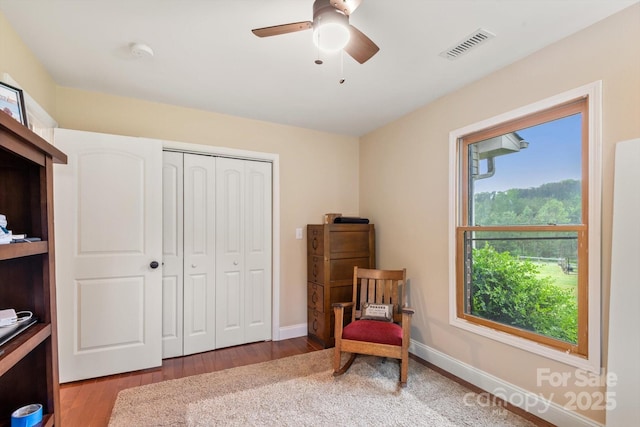 1091 Bill Collins Rd, Columbus, NC 28722 - sitting room with wood finished floors, baseboards, and a ceiling fan