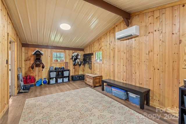 1091 Bill Collins Rd, Columbus, NC 28722 - interior space featuring lofted ceiling, wooden walls, wood finished floors, a wall mounted air conditioner, and wooden ceiling