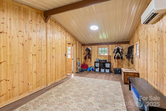 1091 Bill Collins Rd, Columbus, NC 28722 - workout room with an AC wall unit, wooden walls, wood finished floors, wood ceiling, and vaulted ceiling