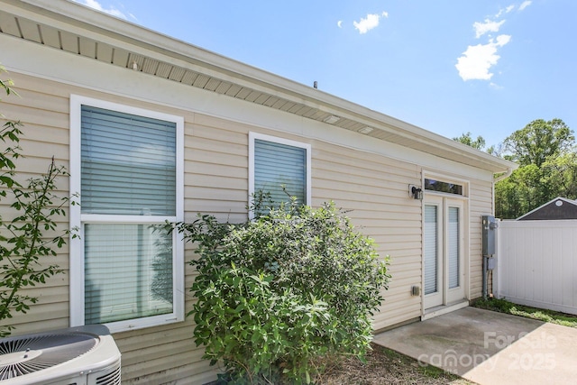 101 N Ferncliff Dr, Mount Holly, NC 28120 - property entrance with central AC unit and fence