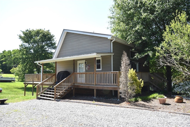 view of front of home featuring a porch and stairs