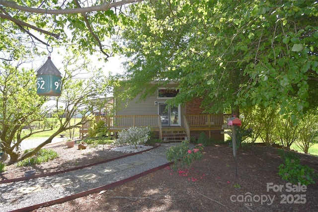 5769 Birch St, Conover, NC 28613 - view of side of property with a deck