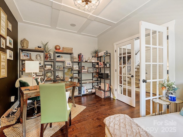 office space with french doors, coffered ceiling, and wood-type flooring
