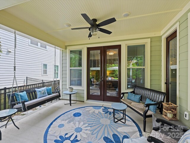 view of patio / terrace featuring outdoor lounge area, ceiling fan, and french doors