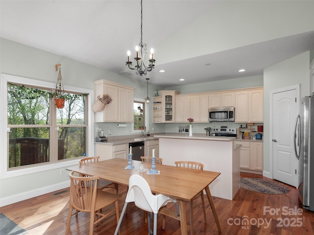 18 Birdsong Ln, Candler, NC 28715 - dining area with recessed lighting, vaulted ceiling, visible vents, light wood-style flooring, and a notable chandelier