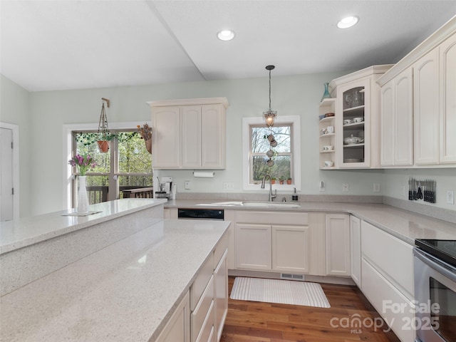 18 Birdsong Ln, Candler, NC 28715 - kitchen with hanging light fixtures, a sink, white cabinetry, and a wealth of natural light