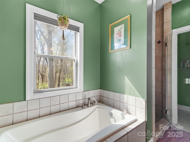 18 Birdsong Ln, Candler, NC 28715 - bathroom with a shower stall and a garden tub