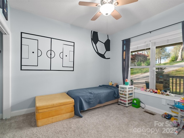 18 Birdsong Ln, Candler, NC 28715 - bedroom with baseboards, a ceiling fan, and carpet flooring