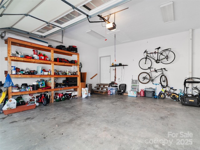 18 Birdsong Ln, Candler, NC 28715 - garage featuring a garage door opener