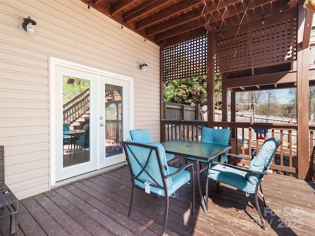 18 Birdsong Ln, Candler, NC 28715 - deck with outdoor dining space, french doors, and fence